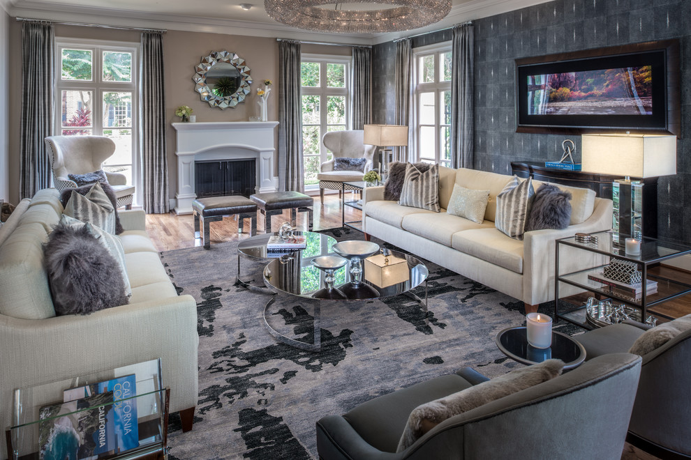 Inspiration for an expansive transitional formal open concept living room in Houston with grey walls, light hardwood floors, a standard fireplace and no tv.