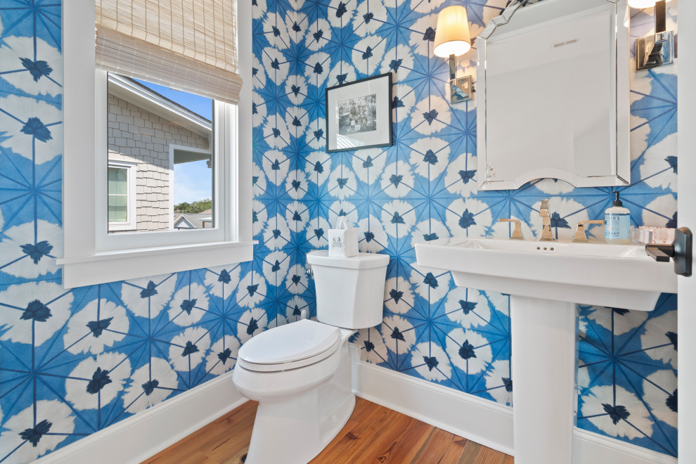 Example of a beach style powder room design in Other