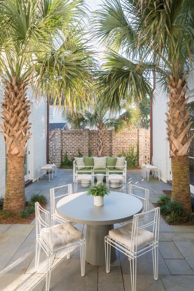 Inspiration for a transitional courtyard patio in Charleston with no cover.
