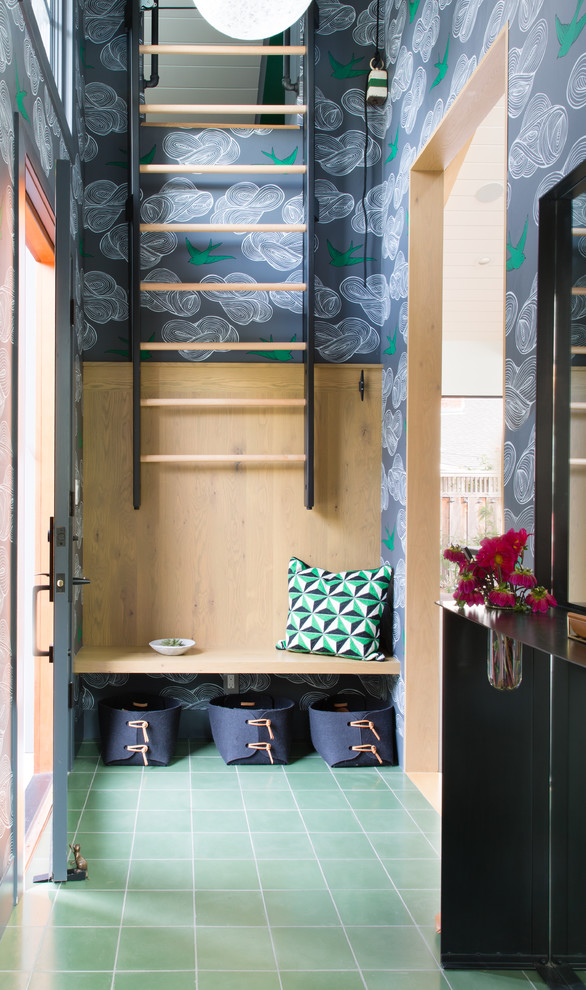 Design ideas for a midcentury vestibule in San Francisco with multi-coloured walls and green floor.