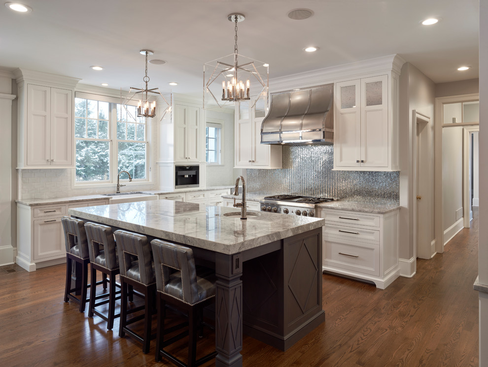 Inspiration for a large modern u-shaped dark wood floor open concept kitchen remodel in Philadelphia with a single-bowl sink, beaded inset cabinets, gray cabinets, quartzite countertops, white backsplash, cement tile backsplash and an island