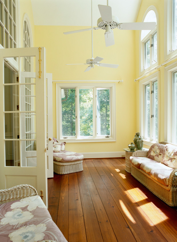 Inspiration for a mid-sized traditional sunroom in St Louis with dark hardwood floors, no fireplace and a standard ceiling.