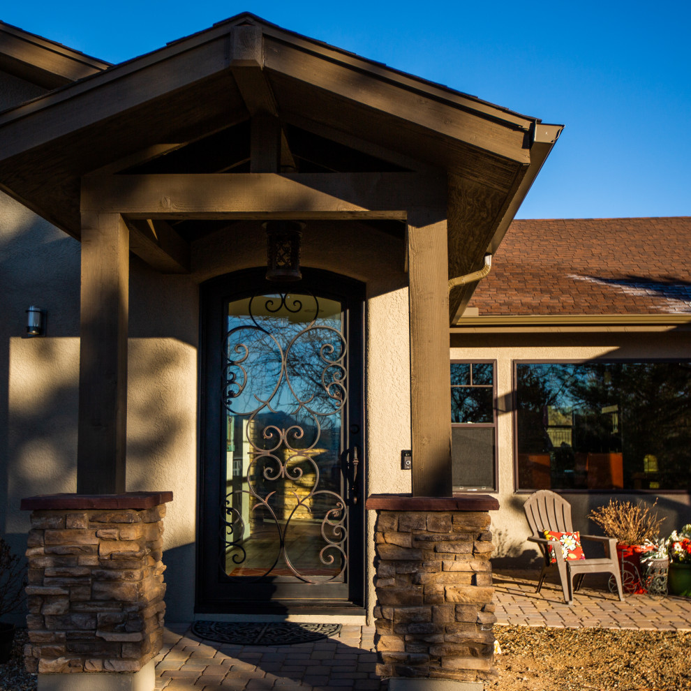 Inspiration for a rustic home design remodel in Phoenix