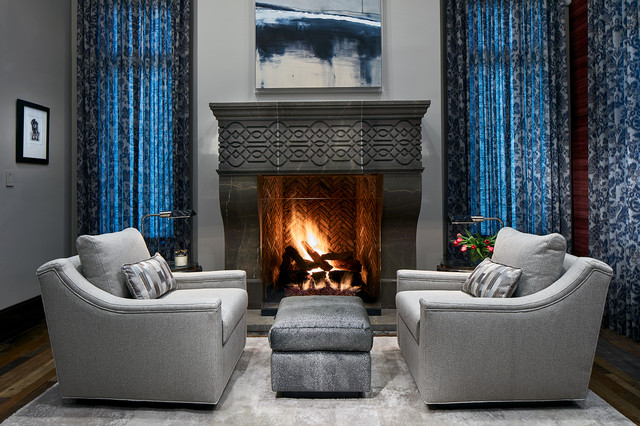 Master Bedroom Sitting Area With Stone Fireplace And Floral