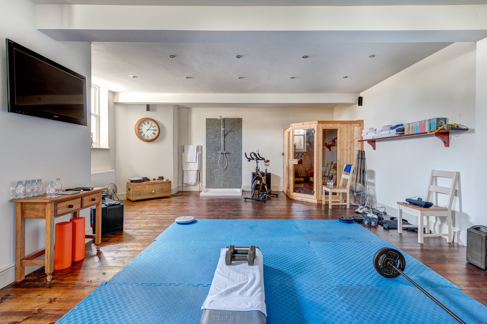 Photo of a transitional multipurpose gym in Devon with white walls.