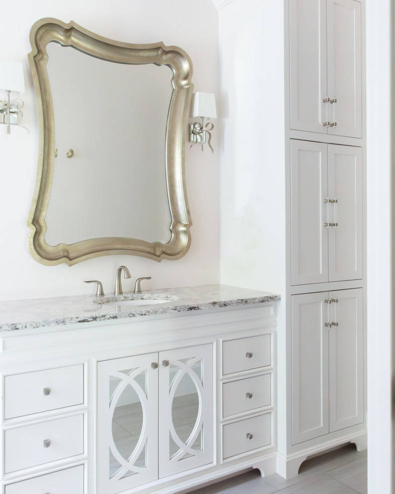 Inspiration for a transitional kids' gray floor and single-sink bathroom remodel in Houston with white cabinets, pink walls, gray countertops, furniture-like cabinets, an undermount sink and a built-in vanity