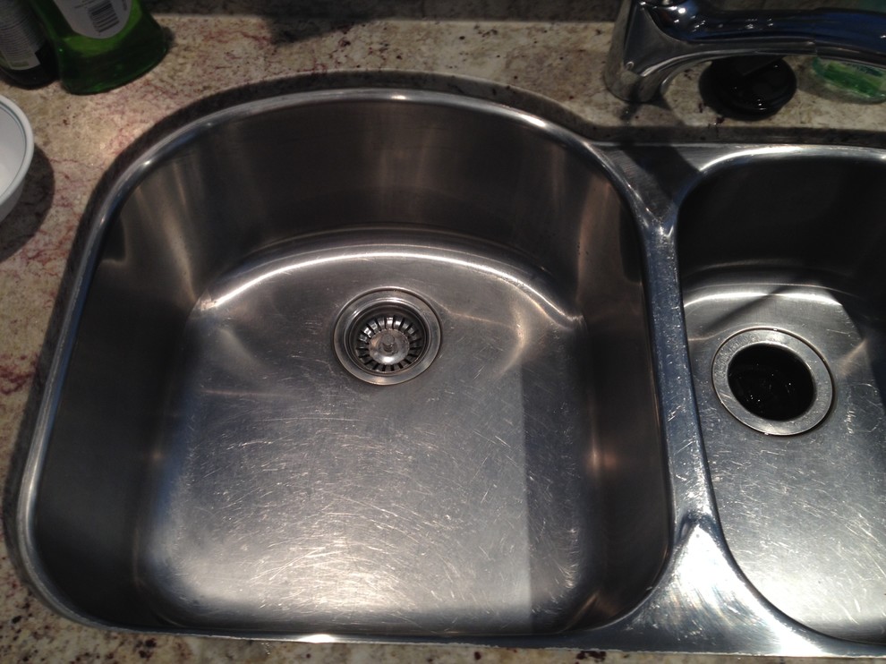 Scratched Kitchen sink... replace? or rebuff (even if possible)?