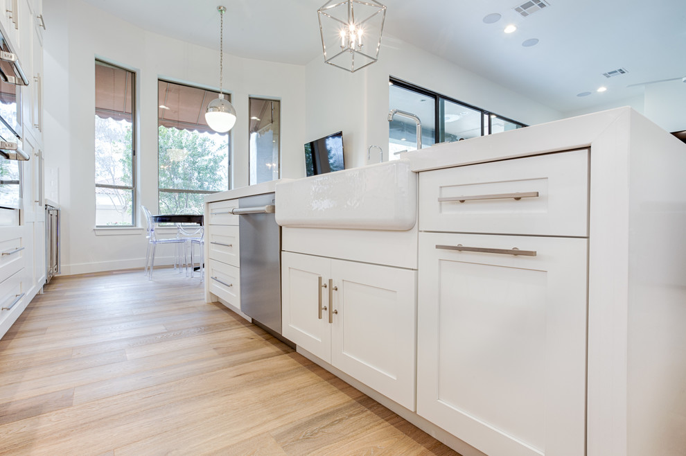 Inspiration for a large transitional galley open concept kitchen remodel in Phoenix with shaker cabinets and an island
