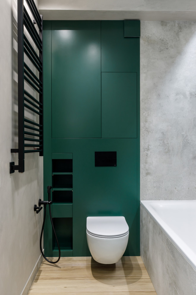 Inspiration for a mid-sized contemporary master bathroom in Moscow with flat-panel cabinets, green cabinets, an alcove tub, a wall-mount toilet, beige tile, porcelain tile, beige walls, porcelain floors, engineered quartz benchtops, brown floor, a hinged shower door, white benchtops and a shower/bathtub combo.