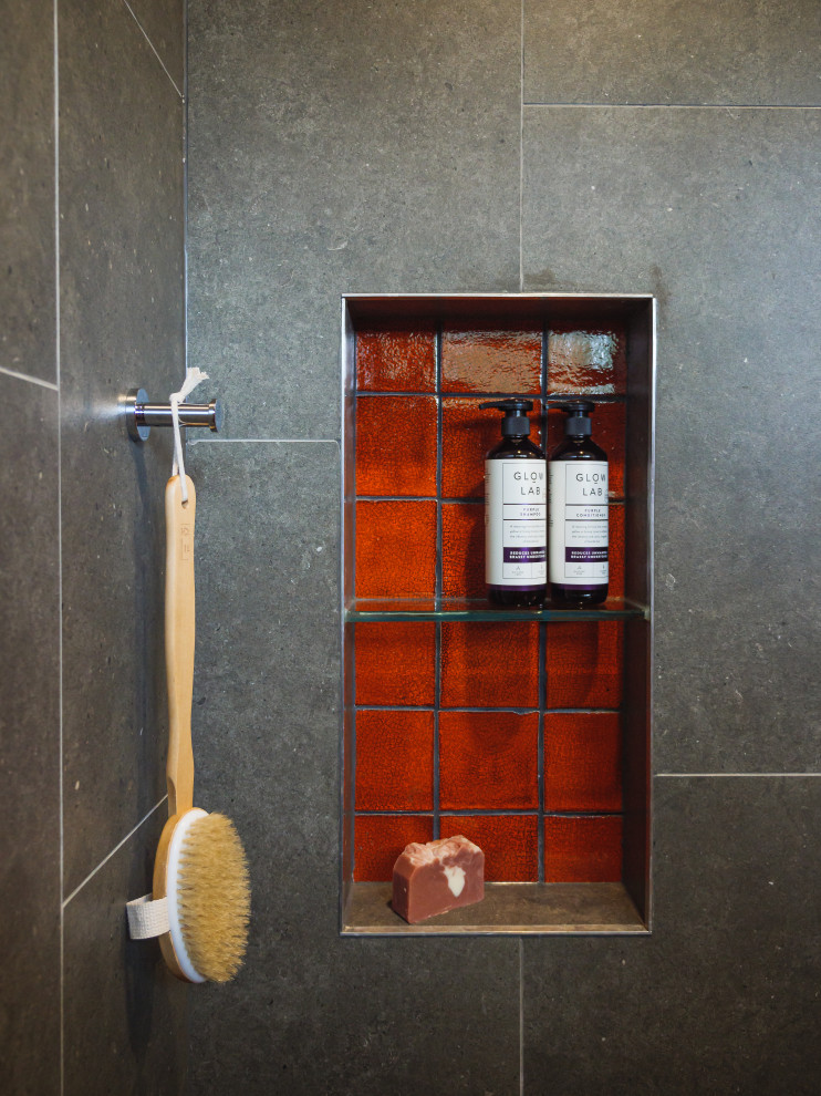 Design ideas for a small contemporary master bathroom in Melbourne with flat-panel cabinets, medium wood cabinets, an open shower, a one-piece toilet, gray tile, porcelain tile, grey walls, porcelain floors, a vessel sink, wood benchtops, grey floor, a niche, a single vanity and a floating vanity.