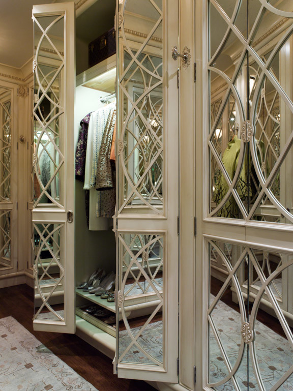 Inspiration for a mid-sized traditional women's dressing room in San Francisco with beaded inset cabinets, white cabinets and medium hardwood floors.