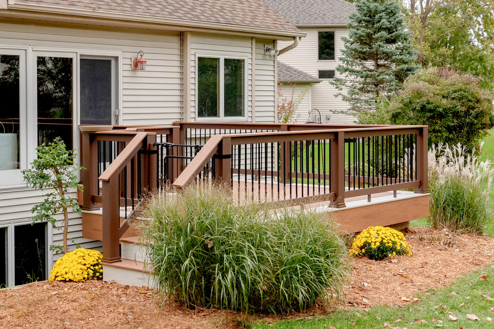 Deck - mid-sized transitional backyard deck idea with no cover