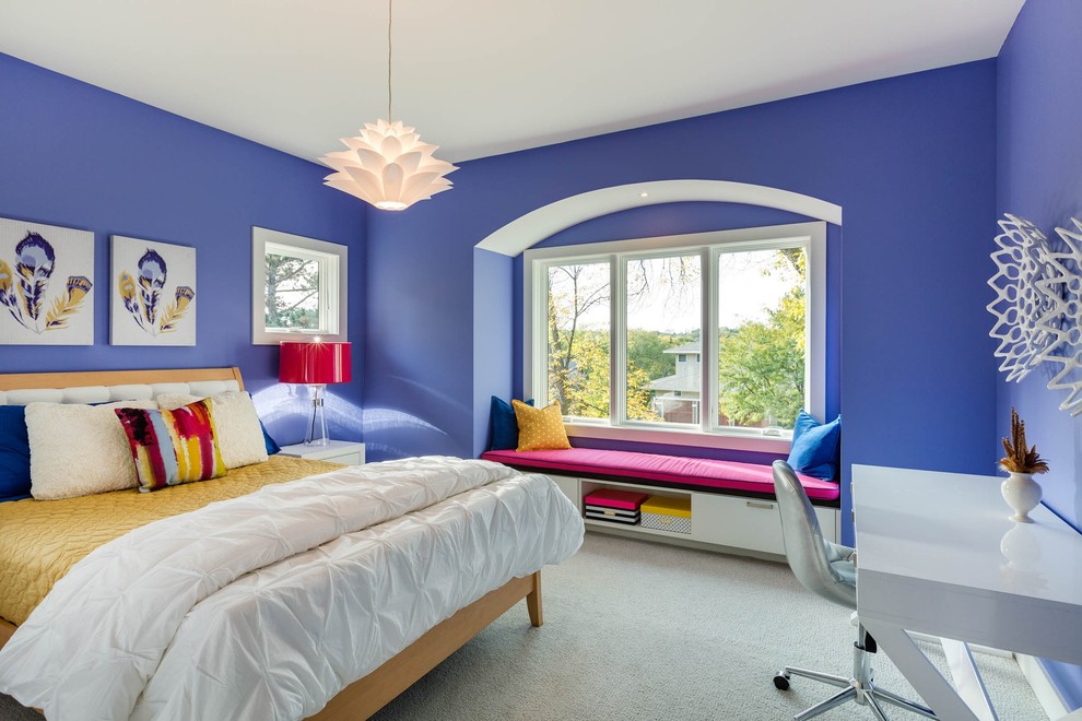 Large contemporary kids' room in Minneapolis with carpet and blue walls for girls.