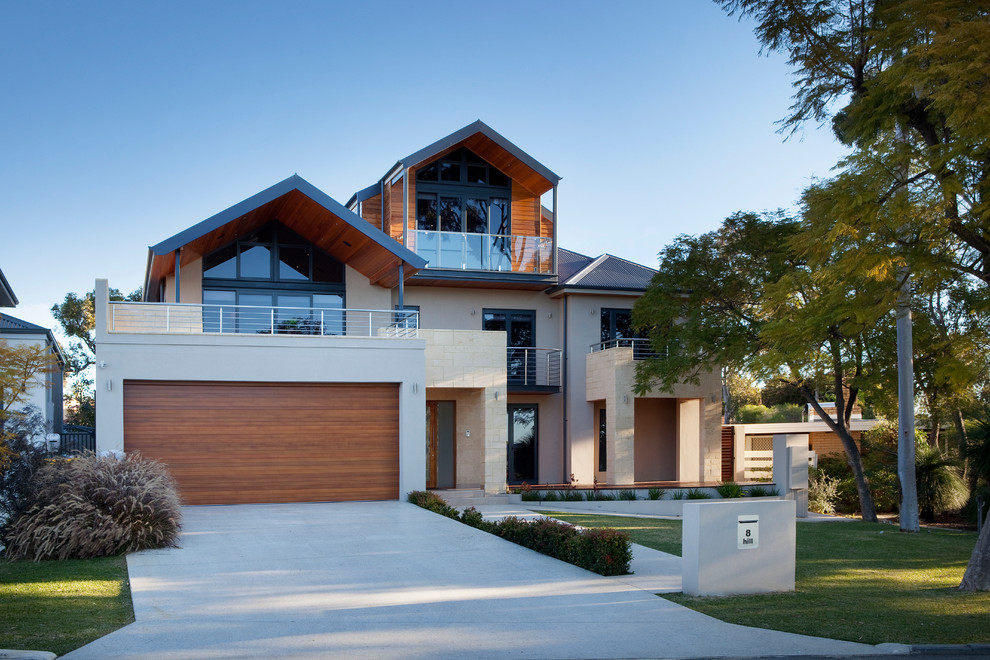 Inspiration for a large transitional three-storey exterior in Perth.