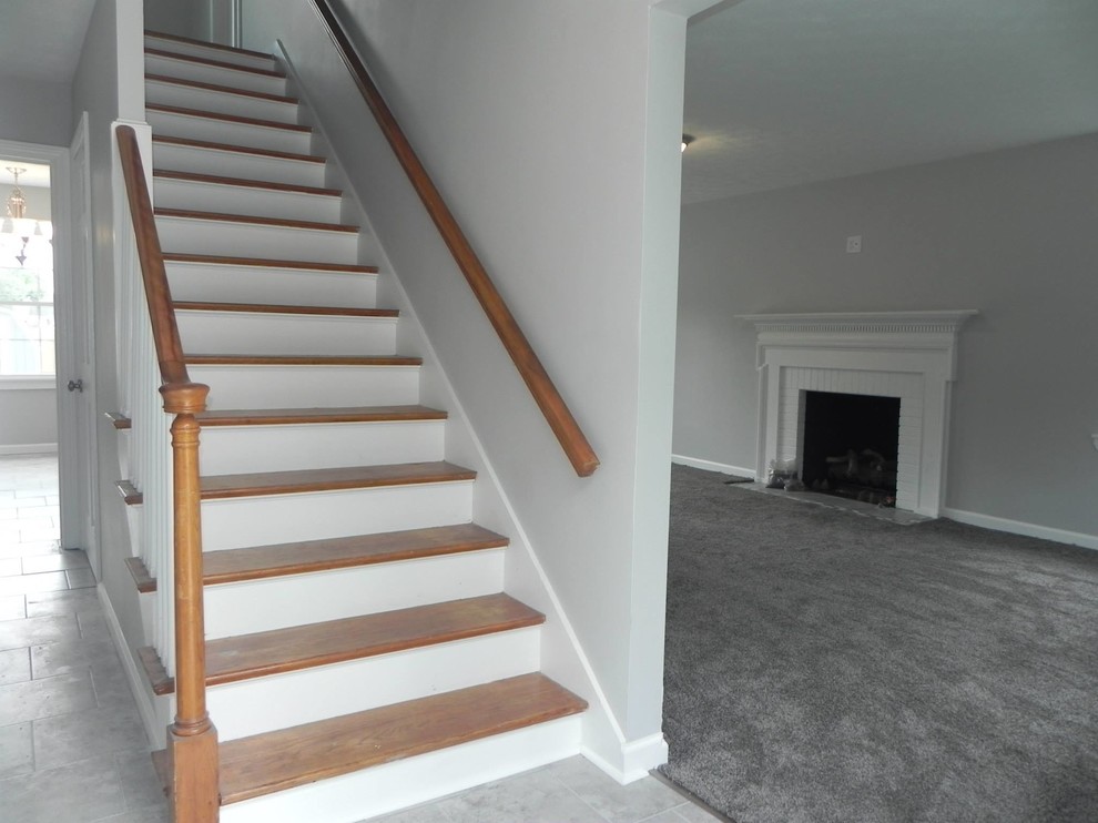Example of a transitional staircase design in Indianapolis