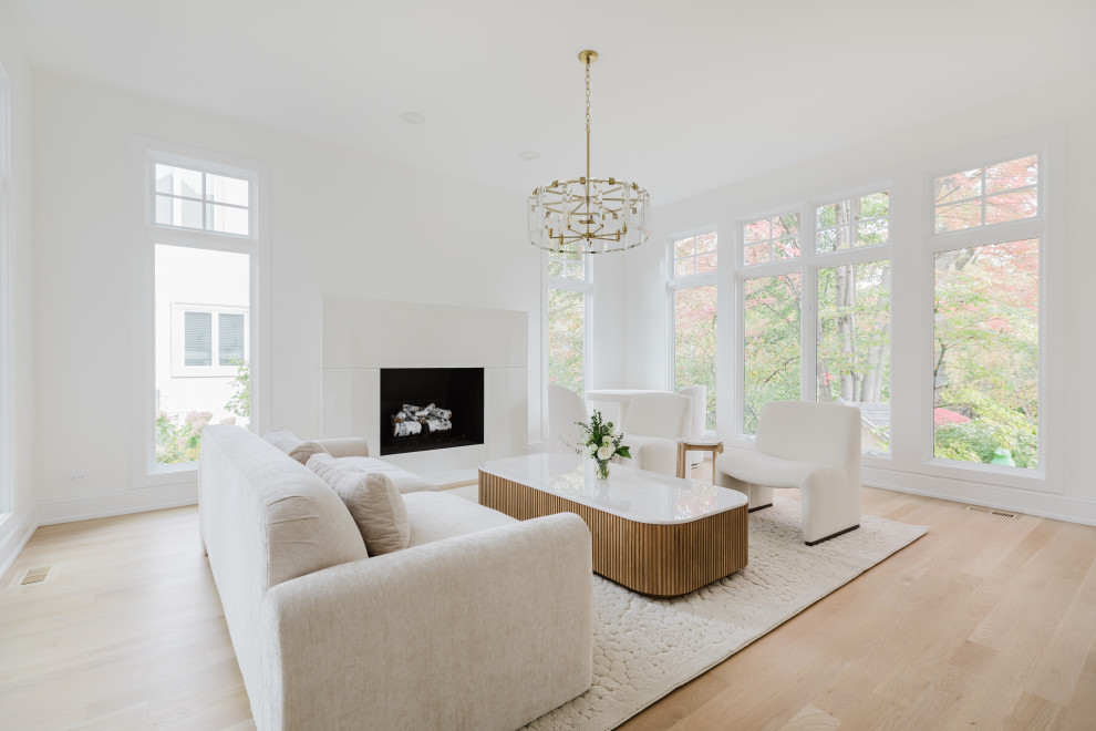 Spacious Modern Living Room with White Furniture and Large Windows