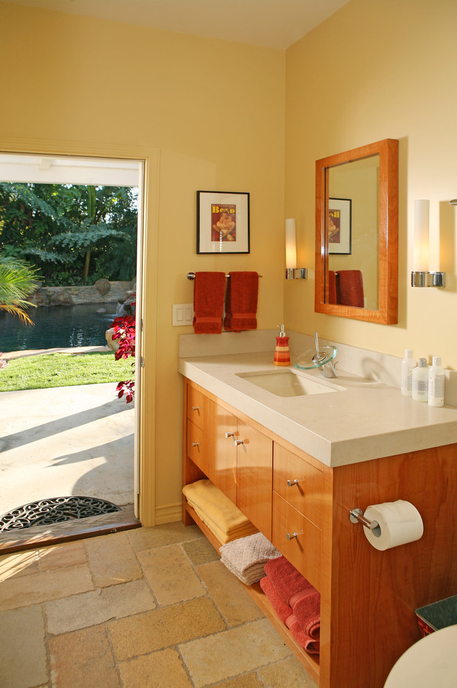 Design ideas for a transitional bathroom in Los Angeles with medium wood cabinets.