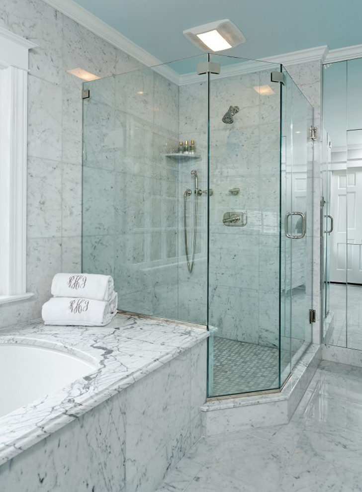 Inspiration for a large traditional 3/4 bathroom in DC Metro with raised-panel cabinets, a corner tub, an open shower, a one-piece toilet, gray tile, stone slab, blue walls, marble floors and a drop-in sink.