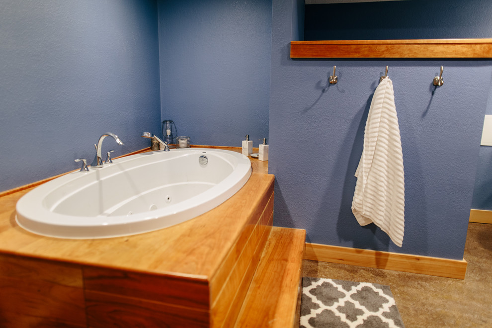 Bathroom - transitional beige floor bathroom idea in Seattle with blue walls and a pedestal sink