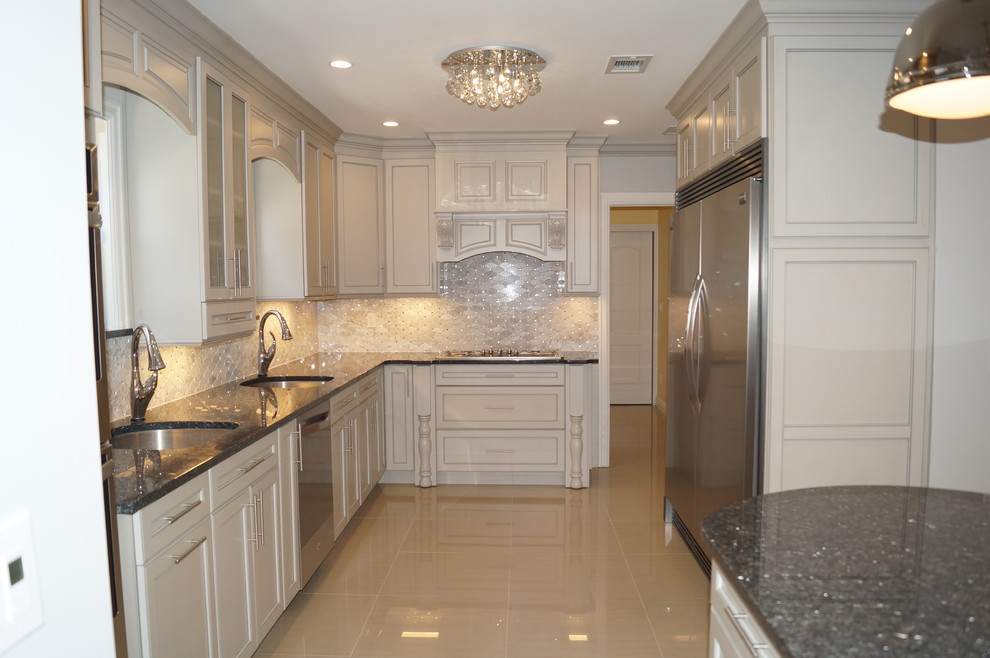Example of a transitional kitchen design in New York
