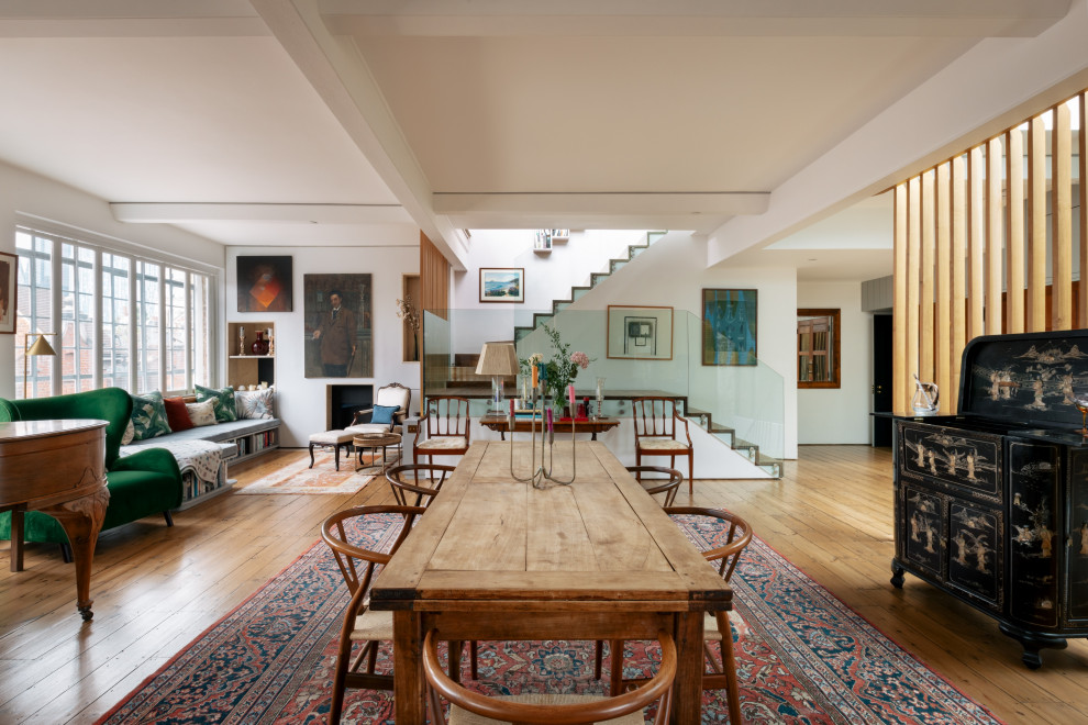 Design ideas for an industrial open plan dining room in London.
