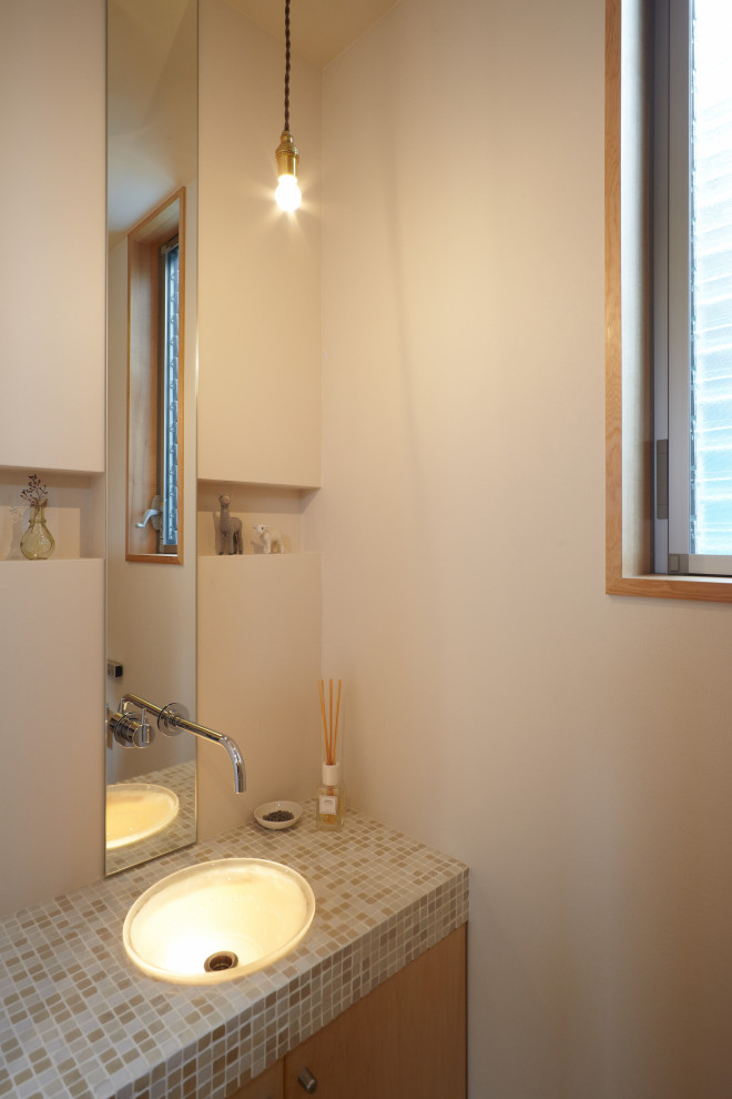 Example of a powder room design in Other