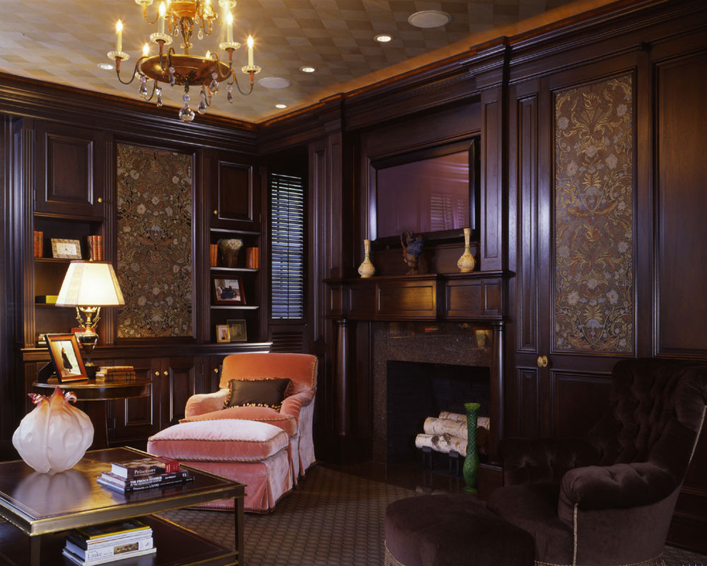Inspiration for a traditional living room in Boston with a library and brown walls.