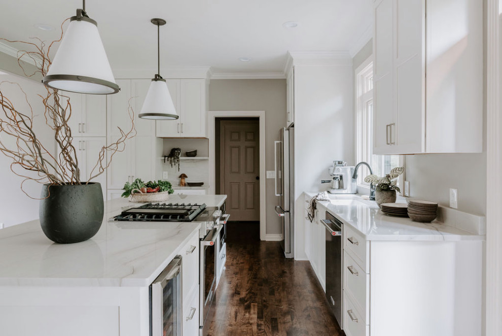 Kitchen - transitional kitchen idea in Omaha with an island