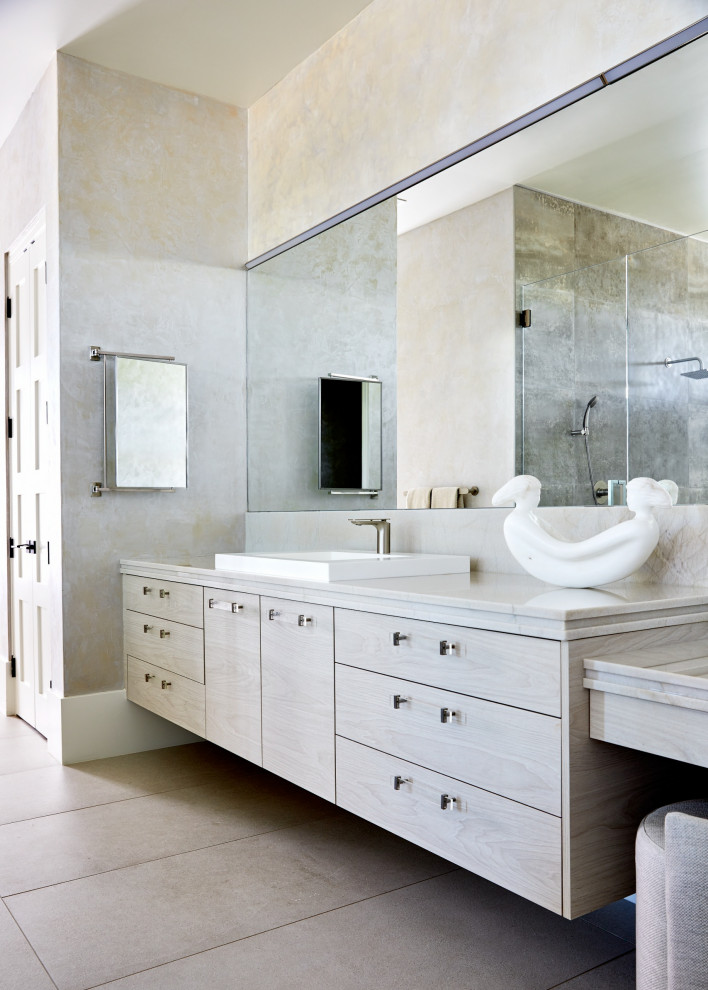 Bathroom - large contemporary master gray tile and porcelain tile porcelain tile, gray floor and double-sink bathroom idea in Phoenix with flat-panel cabinets, beige cabinets, beige walls, a drop-in sink, quartz countertops, a hinged shower door, white countertops and a floating vanity