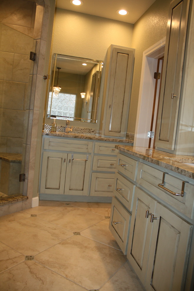 Large transitional master bathroom in Other with raised-panel cabinets, green cabinets, an undermount tub, a corner shower, multi-coloured tile, porcelain tile, green walls, porcelain floors, an undermount sink and granite benchtops.