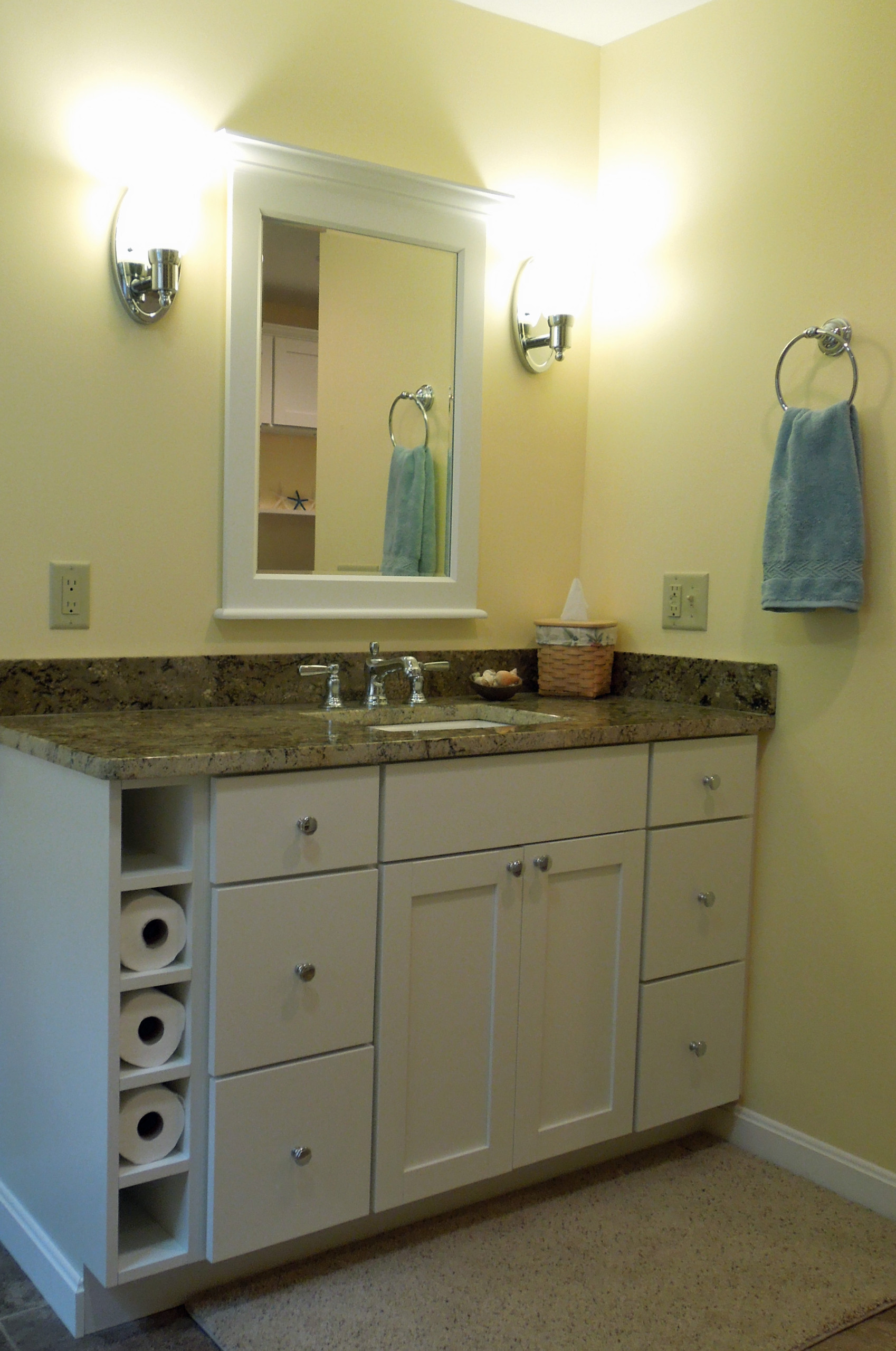 Drawers and cubbies in a lovely bathroom