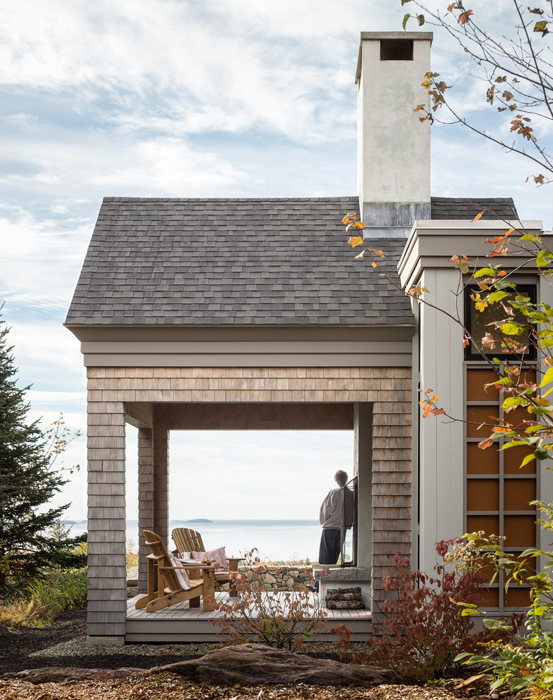 Inspiration for a transitional deck in Portland Maine with a fire feature.