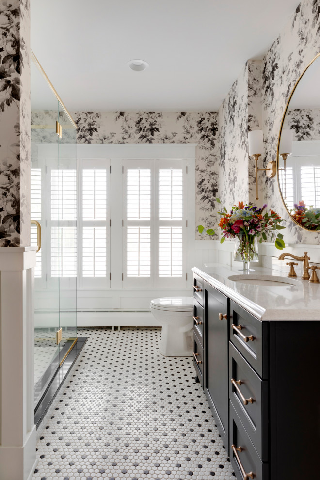 Corner shower - large traditional master porcelain tile, multicolored floor, single-sink and wainscoting corner shower idea in Other with black cabinets, an undermount sink, a hinged shower door, white countertops, shaker cabinets, a two-piece toilet, multicolored walls and a built-in vanity