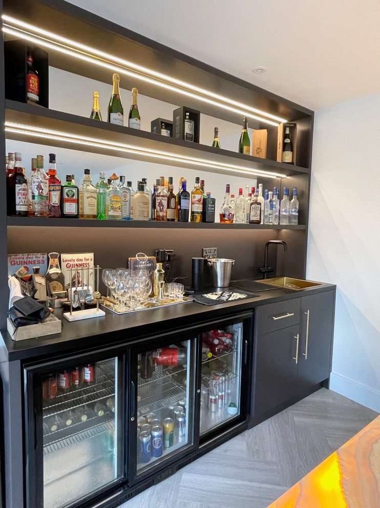 Inspiration for a contemporary home bar in Hertfordshire.