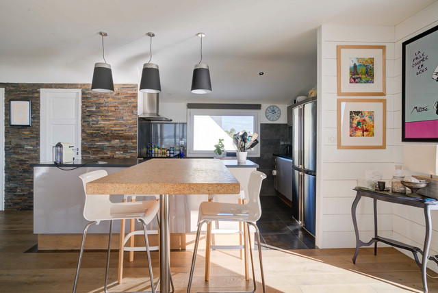 Maison de bord de mer beach-style-kitchen
