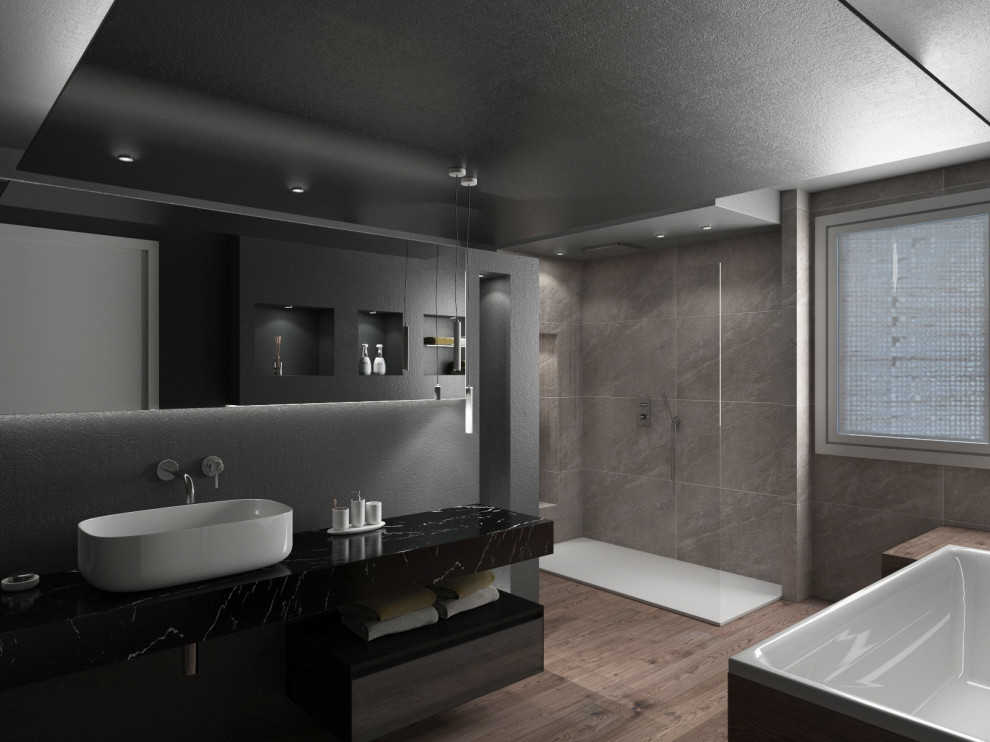 This is an example of an expansive contemporary master bathroom in Venice with flat-panel cabinets, medium wood cabinets, a freestanding tub, an open shower, a two-piece toilet, gray tile, porcelain tile, grey walls, wood-look tile, a vessel sink, marble benchtops, beige floor, an open shower, black benchtops, a niche, a single vanity, a floating vanity, recessed and wallpaper.