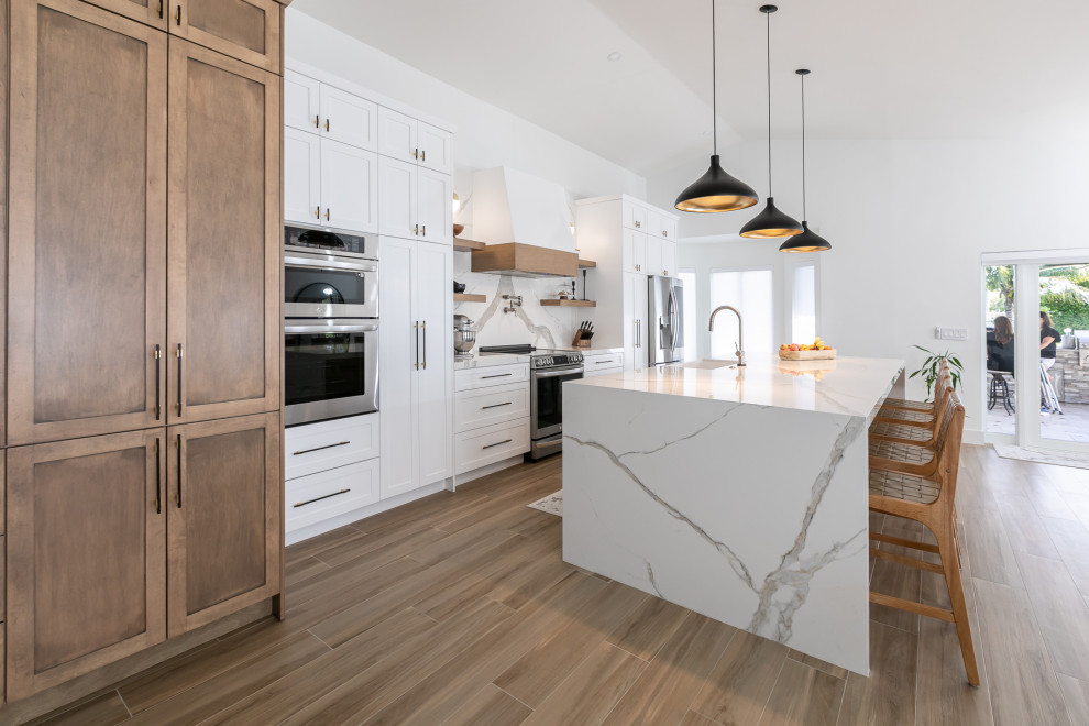 Example of a transitional kitchen design in Miami