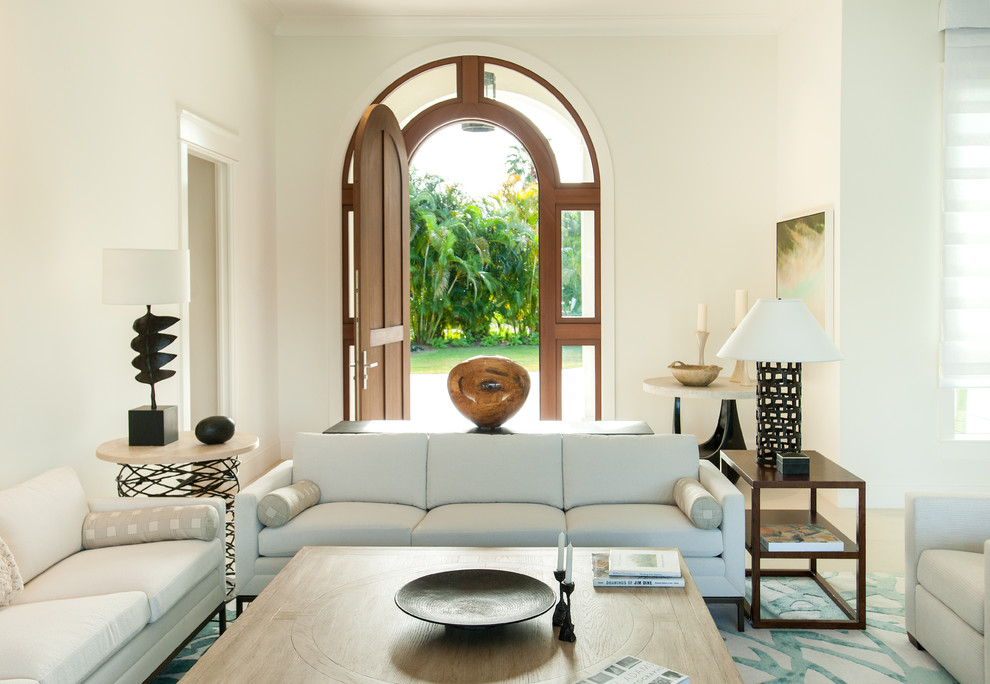 Inspiration for a mid-sized mediterranean formal open concept living room in Tampa with white walls.