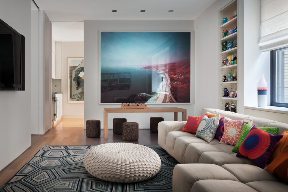 Contemporary formal enclosed living room in Auckland with a wall-mounted tv.