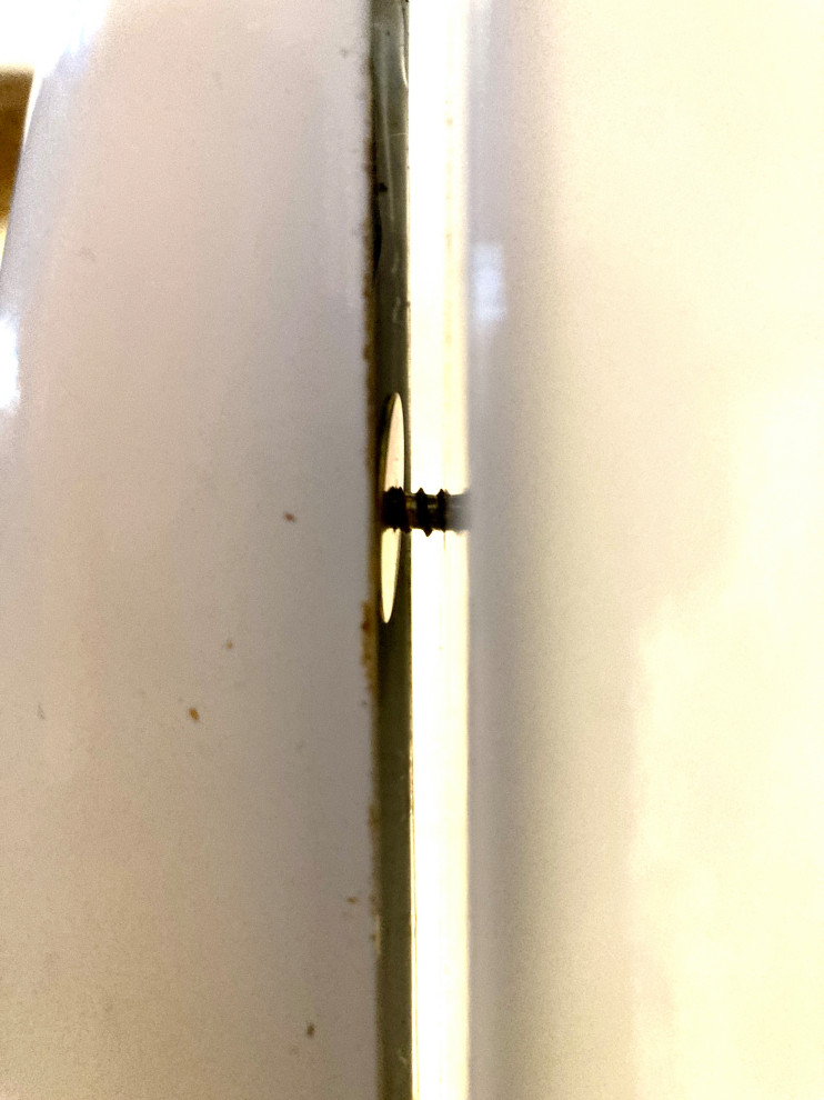 Help with loose door handle on 10year old Maytag refrigerator