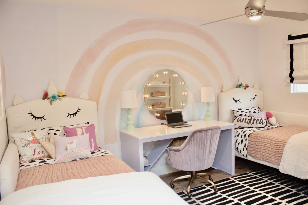 Transitional kids' bedroom in San Diego with white walls for girls.