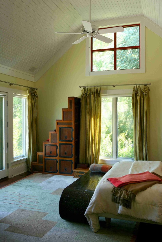Inspiration for a mid-sized country master bedroom in New York with green walls, dark hardwood floors and no fireplace.