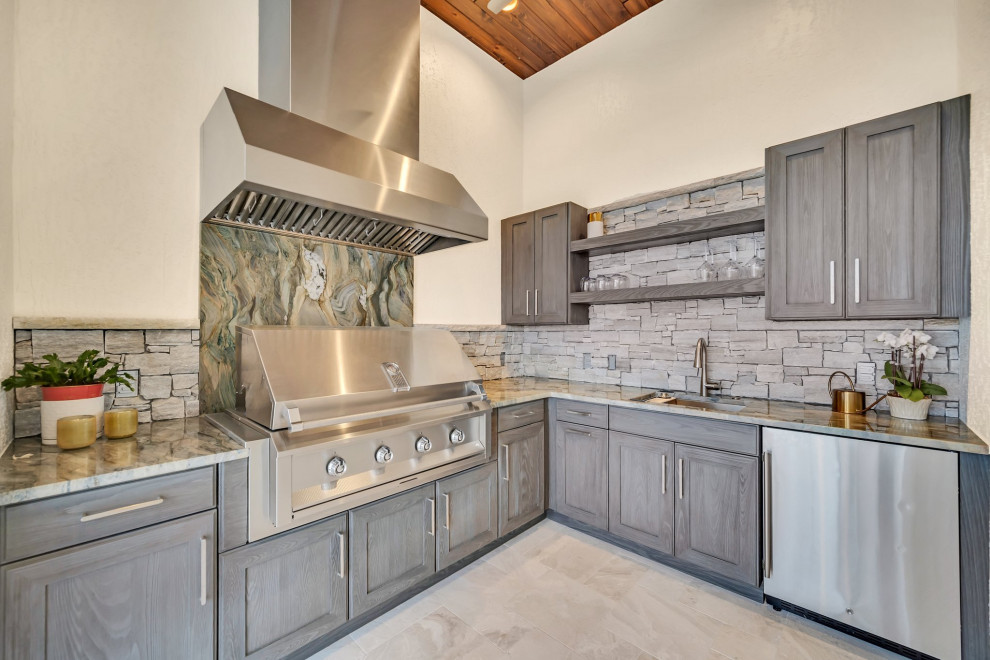 Inspiration for a mid-sized transitional backyard patio kitchen remodel in Orlando