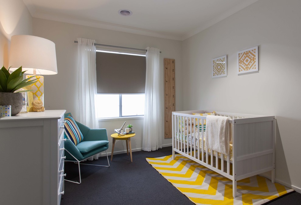 Photo of a mid-sized contemporary gender-neutral nursery in Melbourne with white walls and carpet.