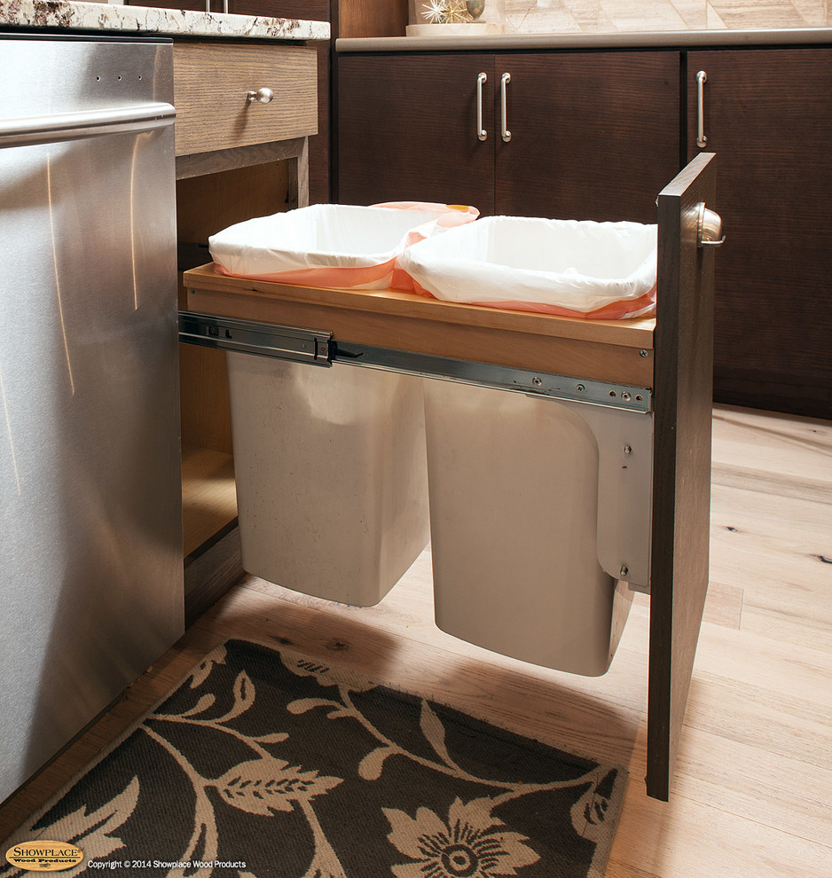 Eclectic l-shaped kitchen photo with flat-panel cabinets, stainless steel appliances and an island