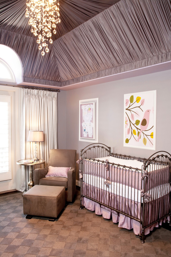 Example of a transitional girl carpeted and brown floor nursery design in Orange County with purple walls