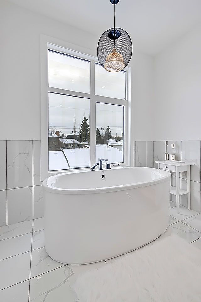 Transitional home design photo in Calgary