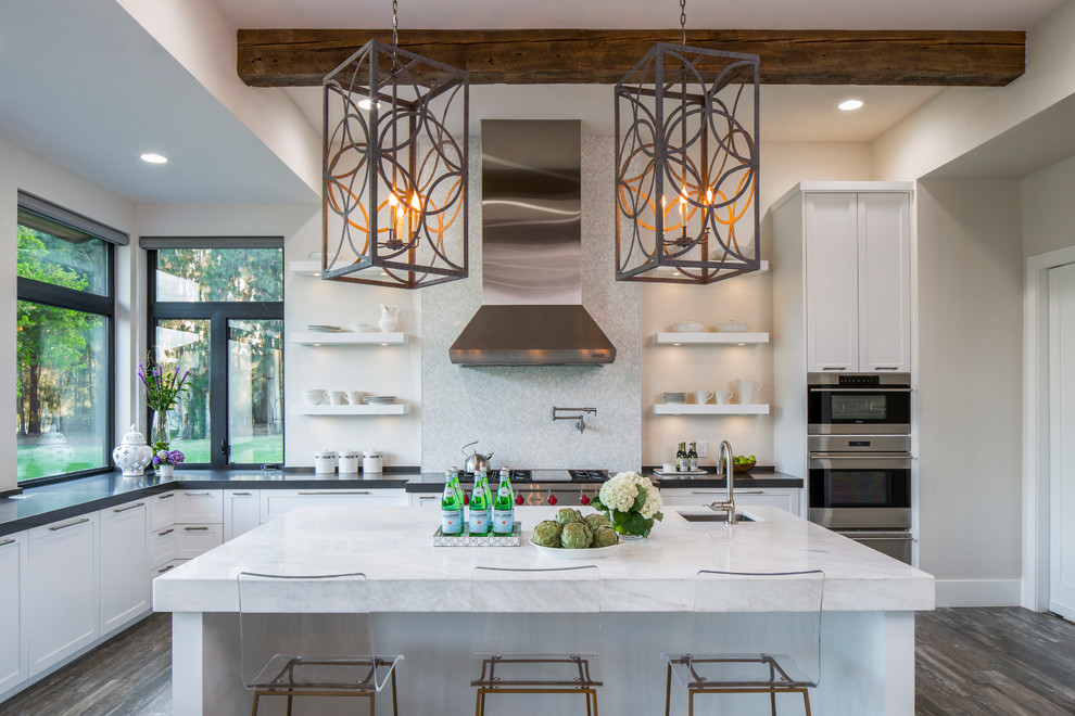 This is an example of a contemporary l-shaped kitchen in Austin with an undermount sink, open cabinets, white cabinets, stainless steel appliances, dark hardwood floors and with island.