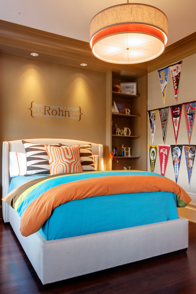 Design ideas for a mid-sized transitional kids' bedroom for boys in Chicago with brown walls and dark hardwood floors.