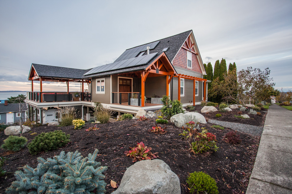 Large farmhouse home design photo in Seattle